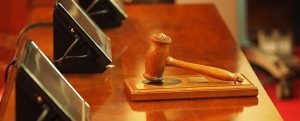 Judge's gavel on a sounding block