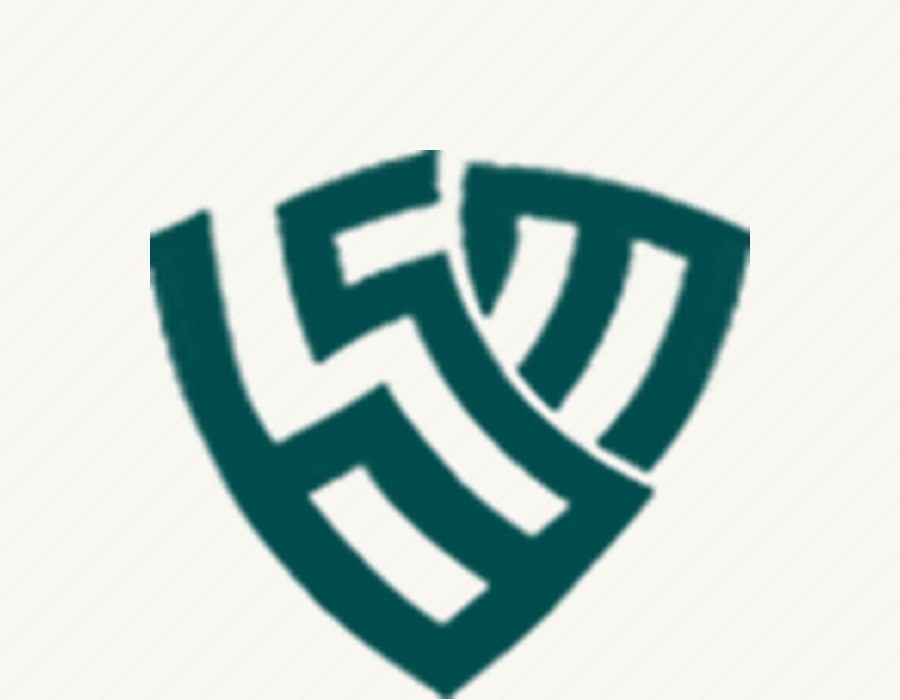 The SMB shield mark in green on a cream panel